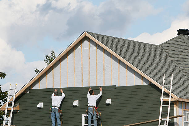 Professional Siding Replacement technician working in Castalia, OH